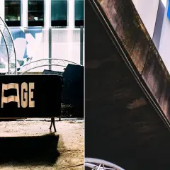 Panneau noir "VIRAGE" devant un bâtiment moderne. Le virage parisien est prêt.
