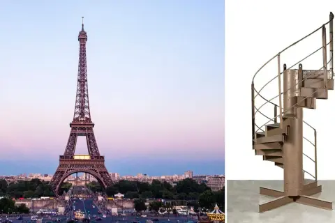 Escalier en colimaçon en métal, rappelant celui du 1er étage de la Tour Eiffel, sur fond blanc.