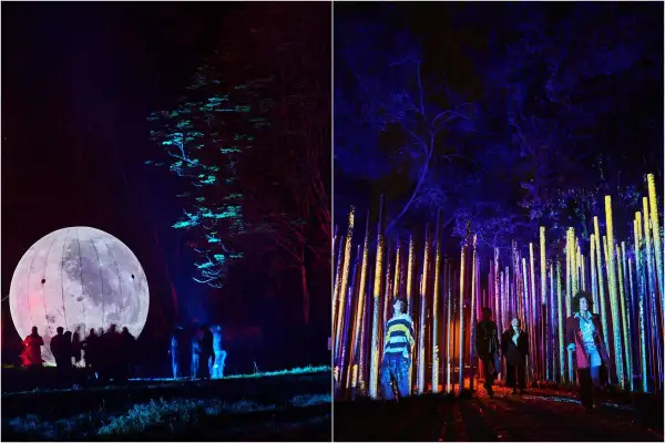 Un parcours lumineux à Paris, avec une lune géante illuminée et une forêt de piliers colorés. L'ambiance est féerique.