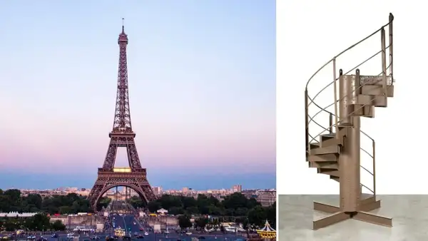 Escalier en colimaçon en métal, rappelant celui du 1er étage de la Tour Eiffel, sur fond blanc.